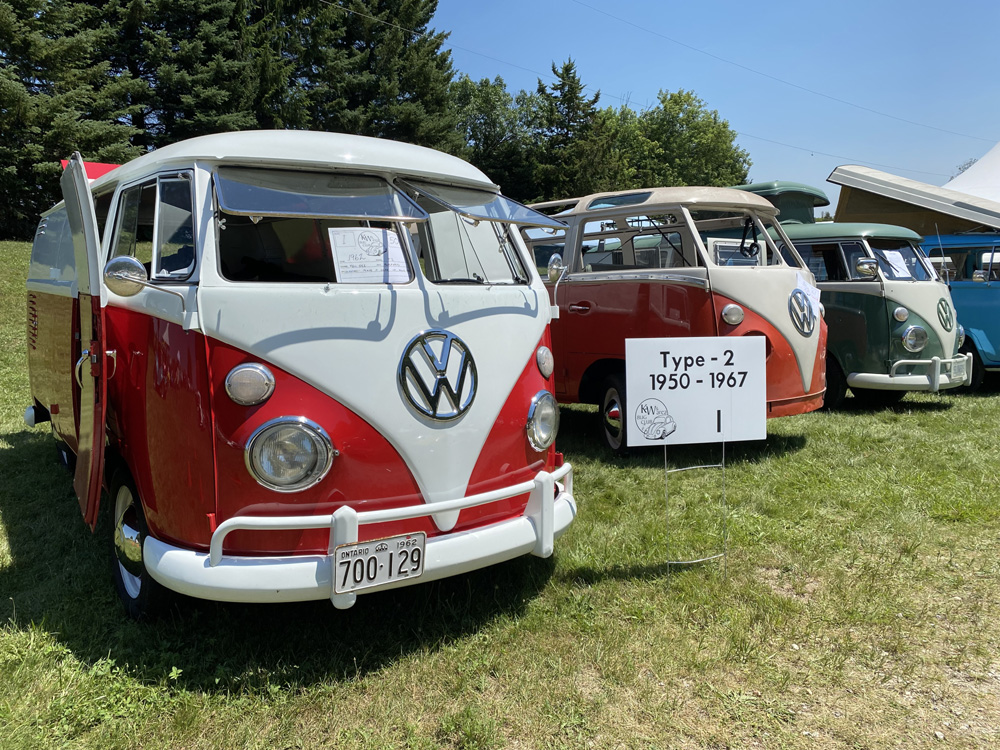 Row of vintage VW Type 2 split-window buses from 19501967 displayed at Bug Out 44