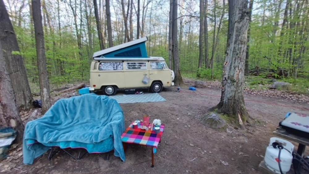 Bay Window Bus at its camping site