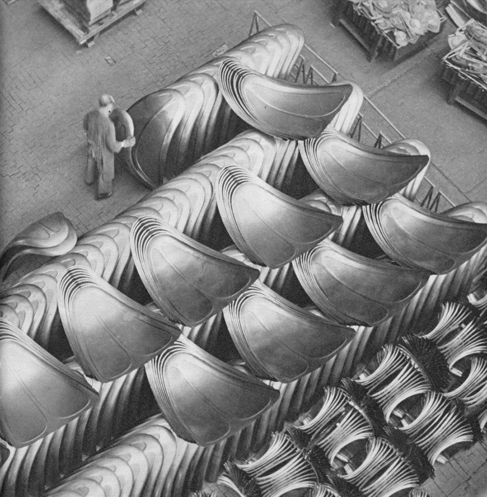 Stacking freshly stamped front lids at Volkswagenwerk Wolfsburg