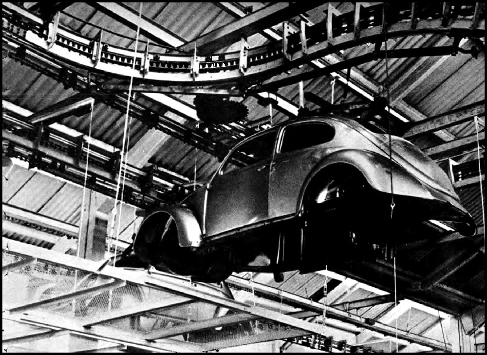 A Fusca body is flying under the roof at VW do Brasil in S&atilde;o Bernardo do Campo