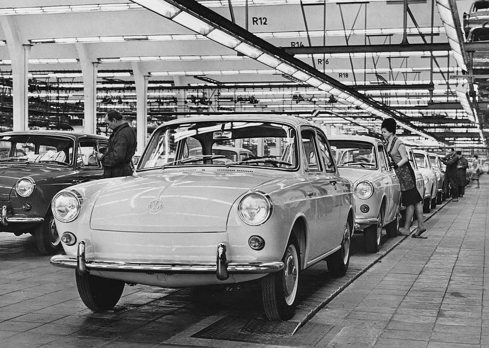  A long line of Volkswagen Type 3 1500 models get a final inspection and a window clean under the bright lights of the final assembly hall at Wolfsburg sometime between introduction in 1961 and mid-1964.