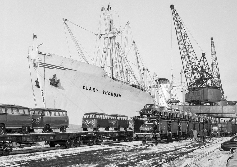 Swedish cargo ship MS Clary Thord&eacute;n is pictured loading Volkswagen Beetles and Type 2 Barndoor Transporters from Deutsche Bundesbahn rail wagons at a snow-covered West German port during early 1955