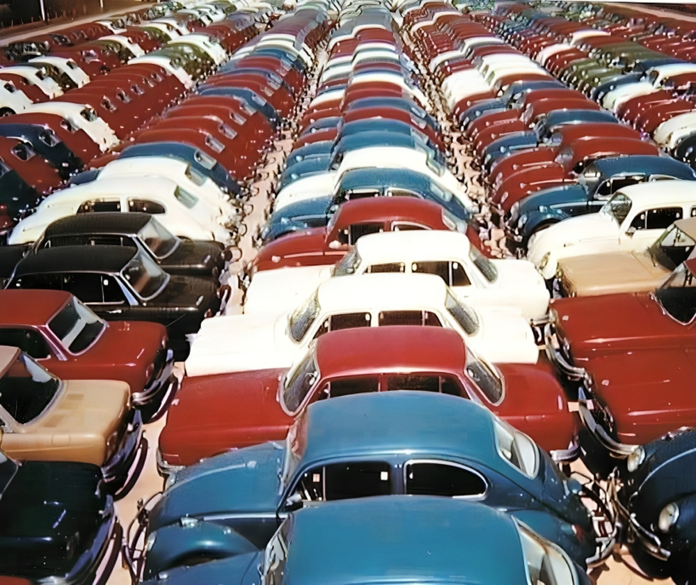 New vehicle departure yard at Volkswagens Anchieta plant in 1969 with rows of Beetles and VW 1600 models awaiting shipment